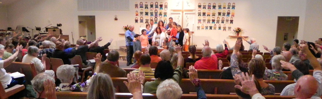 church raising hands